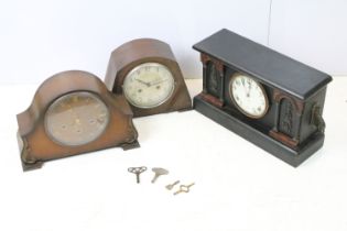 Gilbert, USA, japanned mantel clock, the dial set between two pairs of columns with faux marble
