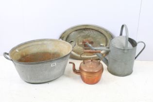 Galvanised oval twin-handled planter, 59cm wide, a galvanised watering can, a copper kettle and a