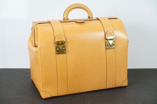 Louis Vuitton - Tanned leather doctor's bag with double straps, handle to top and gold hardware. Key