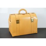 Louis Vuitton - Tanned leather doctor's bag with double straps, handle to top and gold hardware. Key