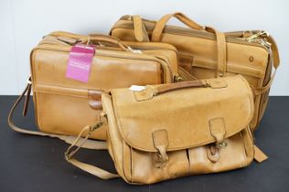 Three leather Hartmann bags to include shoulder bag, wide brief case and large holdall