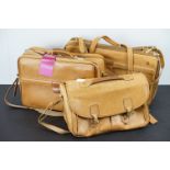 Three leather Hartmann bags to include shoulder bag, wide brief case and large holdall