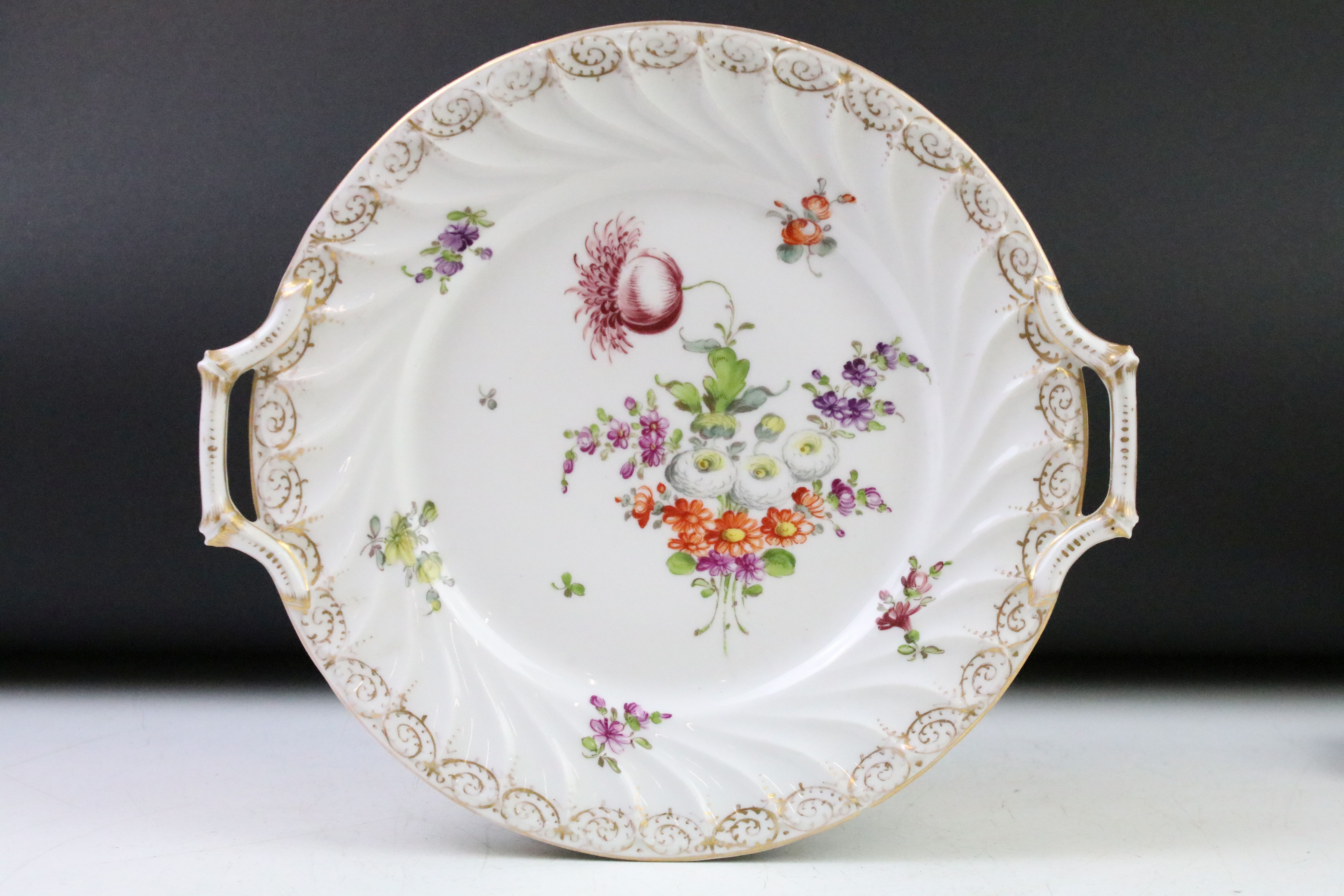 Two Dresden porcelain twin handled plates with hand painted floral decoration and gilt detail to - Image 2 of 8