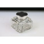 Early 20th century silver lidded glass desk inkwell of square form, with star cut base, approx