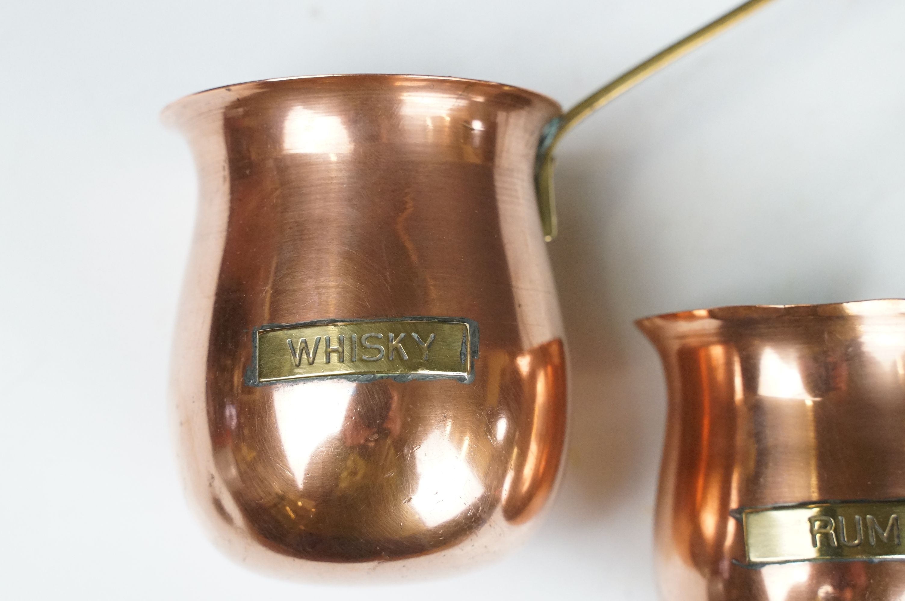 Set of Three Copper hanging graduating Spirit Measures including whisky, rum and brandy, longest - Image 2 of 7