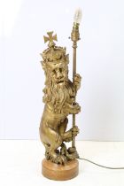 Table lamp modelled as a gilt lion wearing a crown, 62cm high