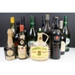 Collection of 14 bottles of wine and spirits to include Harvey's Bristol Cream, Courvoisier, D.O.