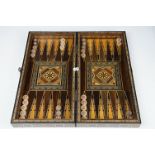 Parquetry inlaid wooden games box, with internal backgammon board and external chess / draughts