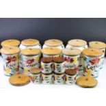 Collection of Toni Raymond pottery kitchen storage jars each with hand painted names and details and