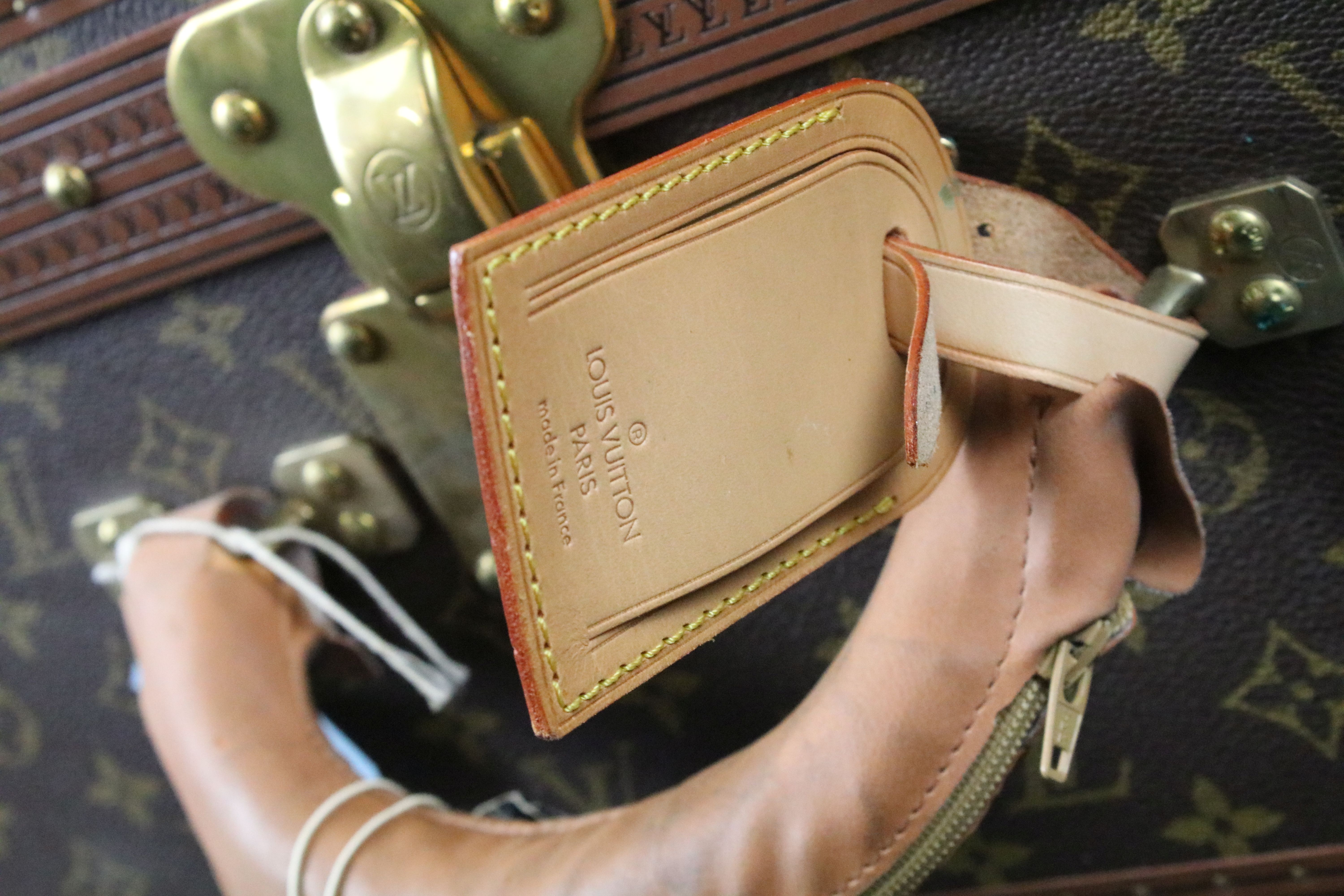 Louis Vuitton - Monogrammed canvas trunk with brass fittings and lock, opening to reveal beige - Image 11 of 17