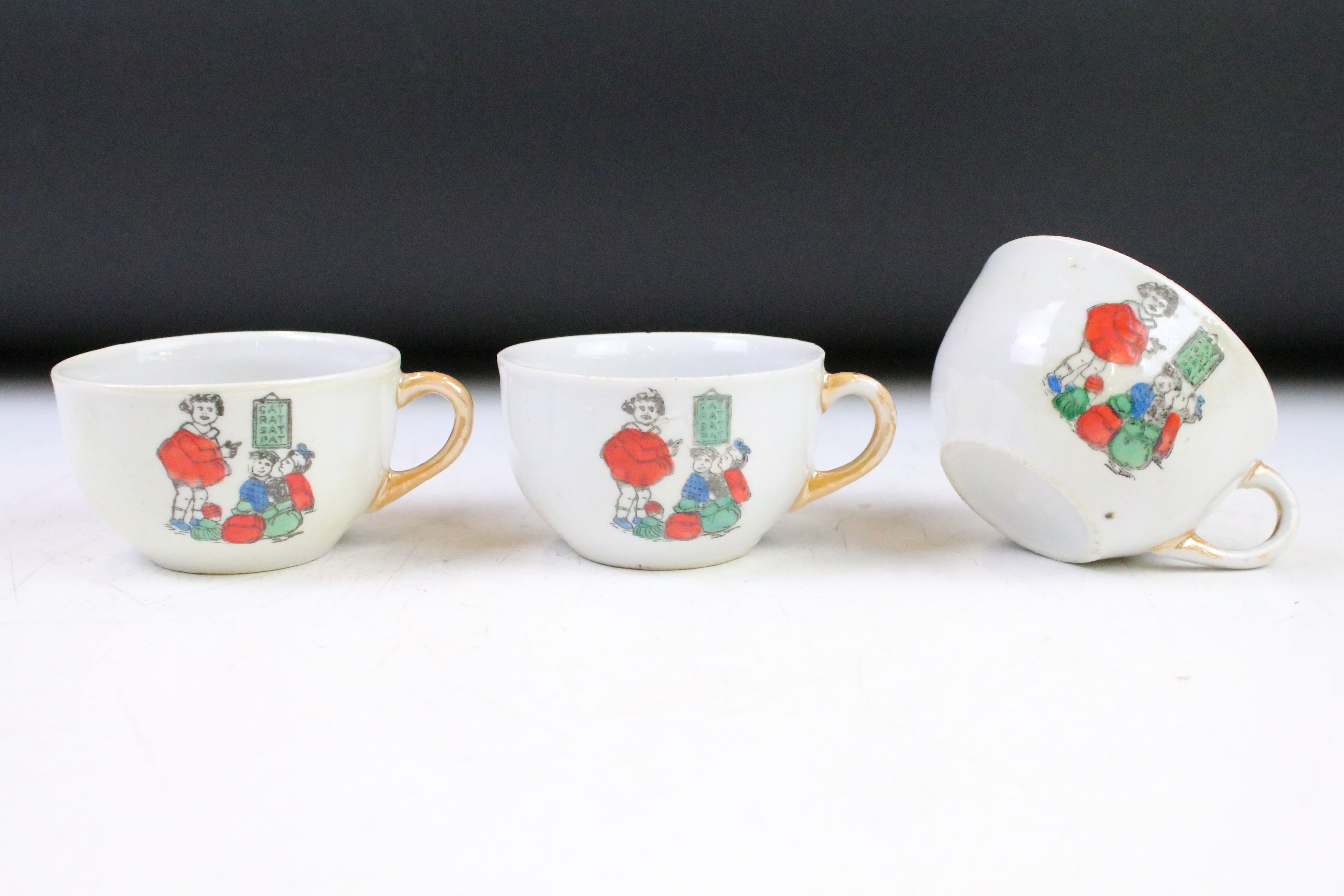 Two vintage porcelain childs tea sets to include a Little Red Riding Hood tea set and a tea set with - Image 14 of 14