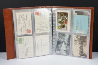 Album of approx. 67 Early 20th century Postcards and Greeting Cards including a Mabel Lucie Attwell