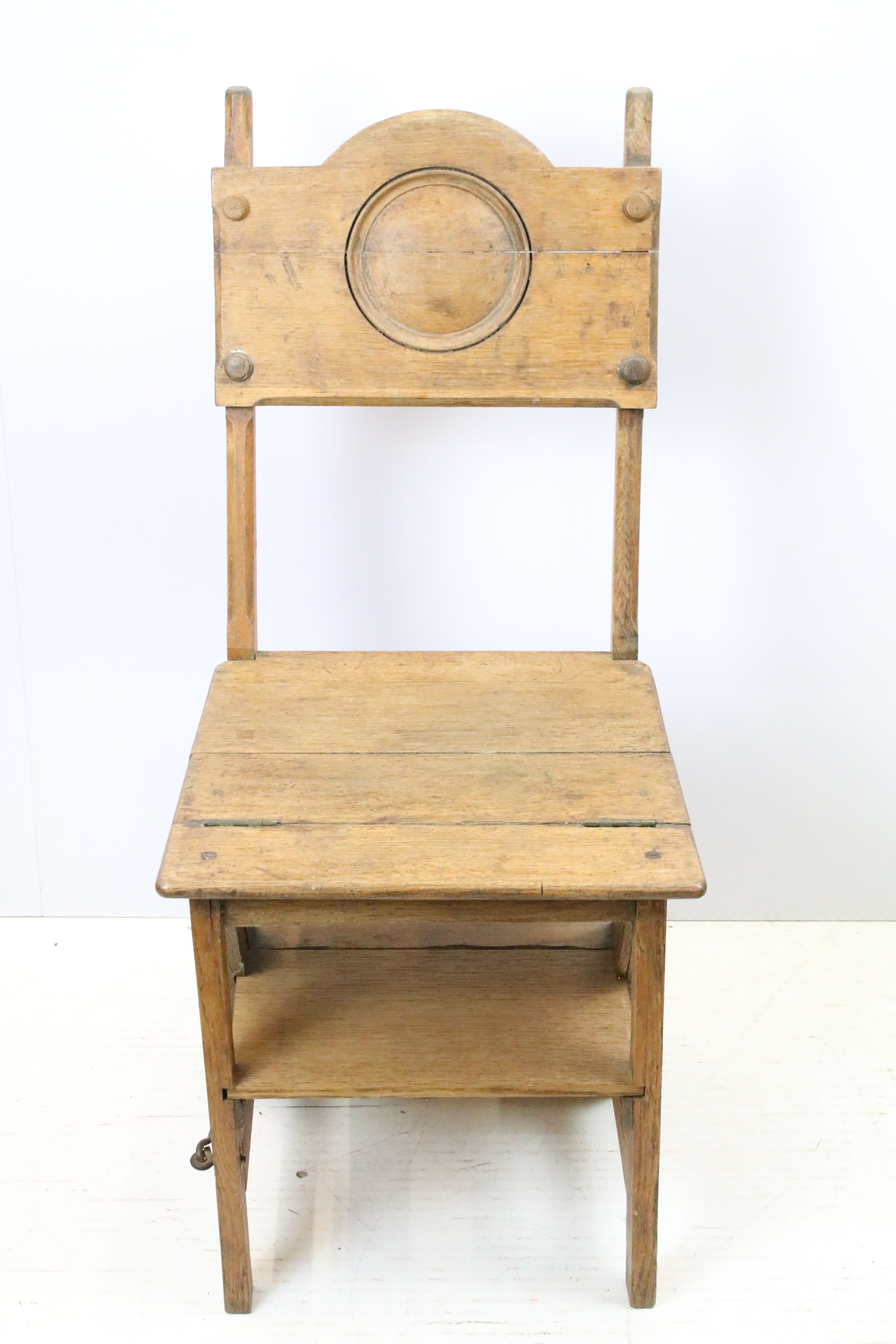 Arts and Crafts metamorphic library chair, the arched backrest with a central circular panel, on - Image 2 of 5