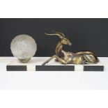 Art Deco Table Lamp mounted with an Antelope and globular glass shade on a marble plinth base,