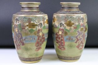 Pair of Japanese Satsuma vases decorated with Geishas in a landscape, gold seal marks to base,