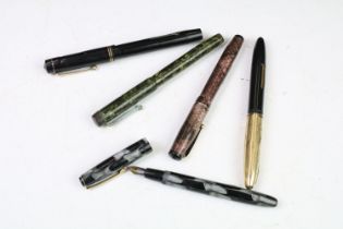 Group of five fountain pens to include four gold nibbed examples, featuring Swan, Sheaffer, etc
