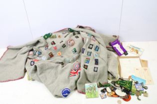 Collection of mid century boy scout related items to include patches and badges, handbooks, and