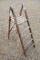 Folding wooden decorator's ladder with four steps and platform, 126cm high x 38cm wide x 91cm