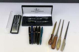 Collection of fountain pens to include 14ct gold nibs, letter opener and pen set