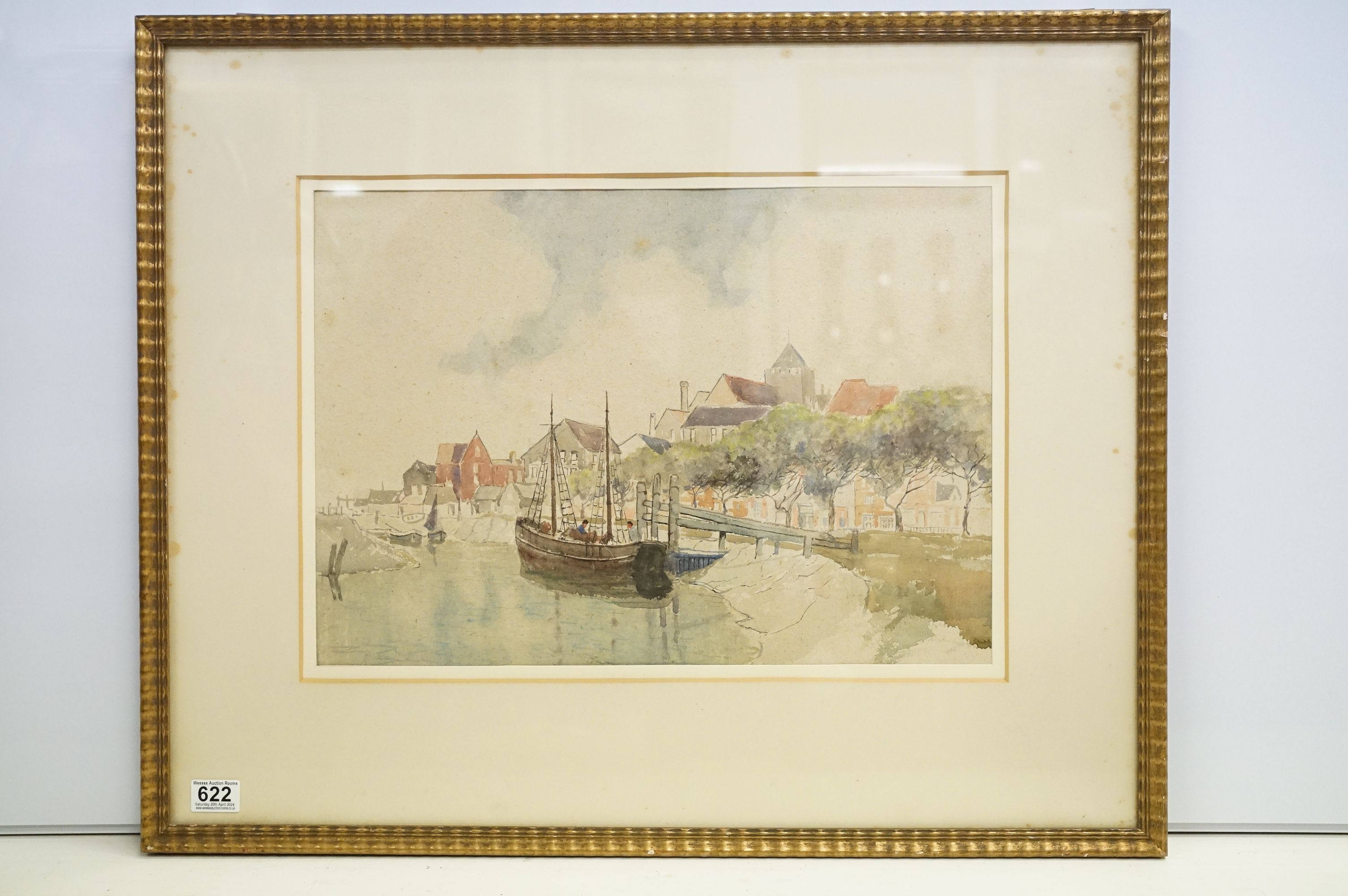 Early 20th C watercolour of an estuary town view with fishing boats, 37cm x 52.5cm