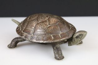 An early 20th century reception / shop counter top bell in the form of a tortoise.