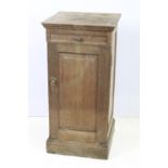 Early 20th Century oak side cupboard having a flared top with drawer beneath having turned knob