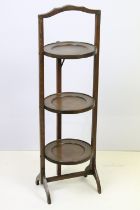 Late 19th / early 20th century three tier mahogany folding cake stand, approx 89cm tall