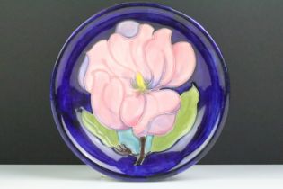 Moorcroft Magnolia pattern shallow bowl, 18.5cm diameter, impressed marks and signed WM