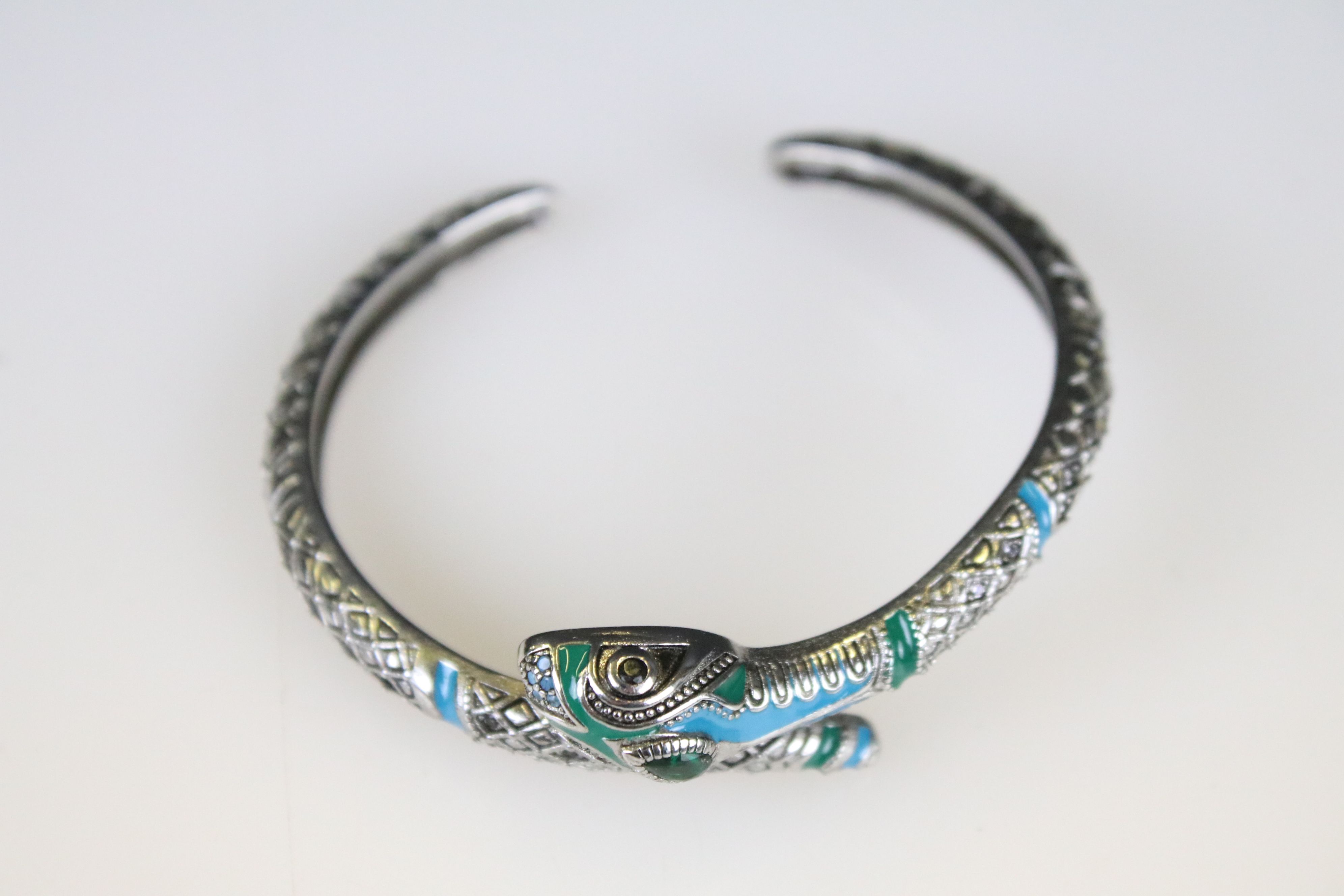 A ladies bangle bracelet with enamel decoration in the form of a snake, marked 925 to the verso. - Image 2 of 3