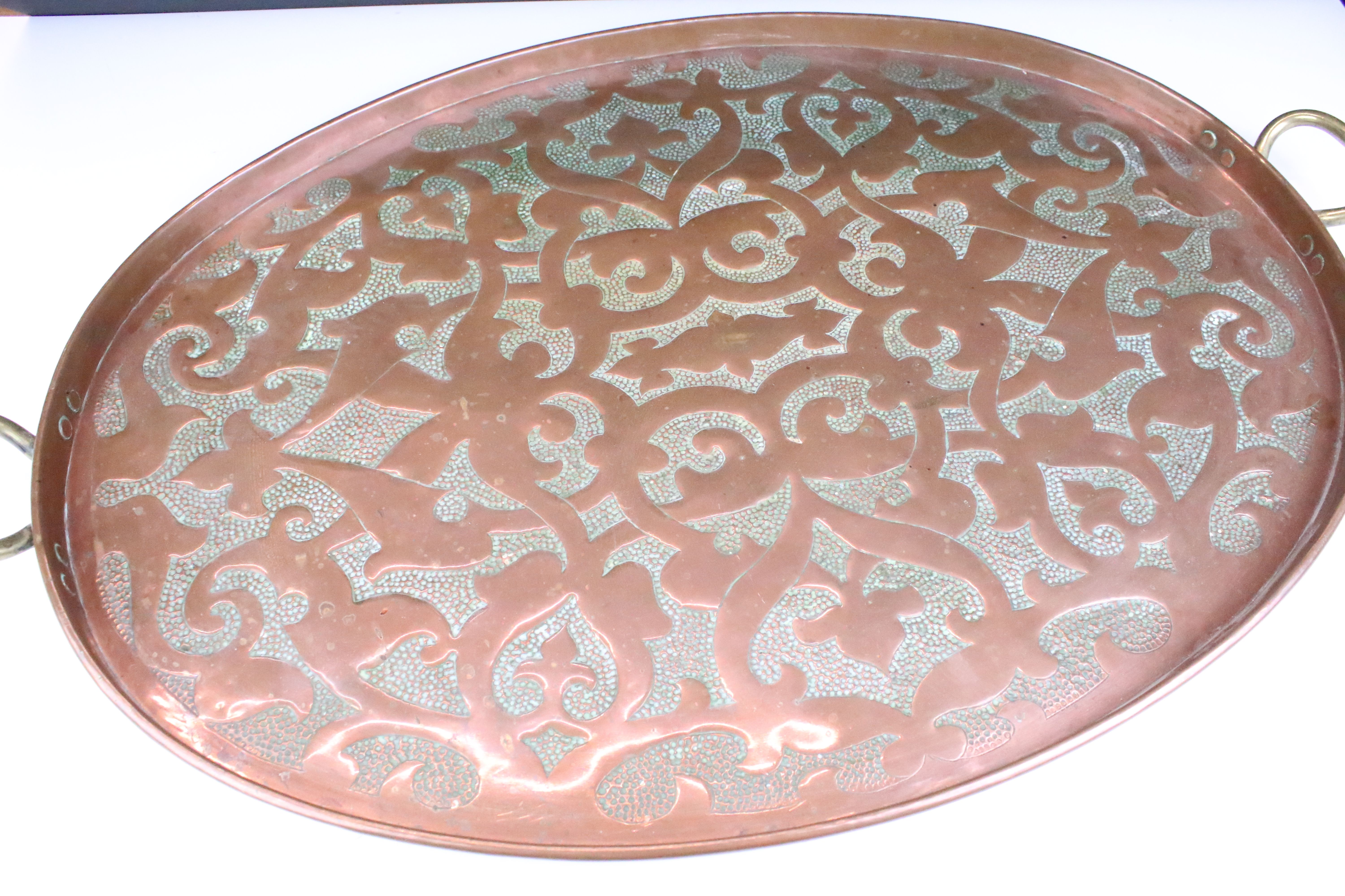 Early 20th Century hammered copper tray having stylised hammered detailing to tray and twin brass - Image 2 of 4