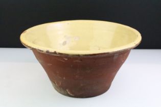 19th century Terracotta Dairy Bowl with cream glazed interior, 34cm diameter