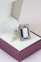 Substantial silver CZ and central opal panelled dress ring