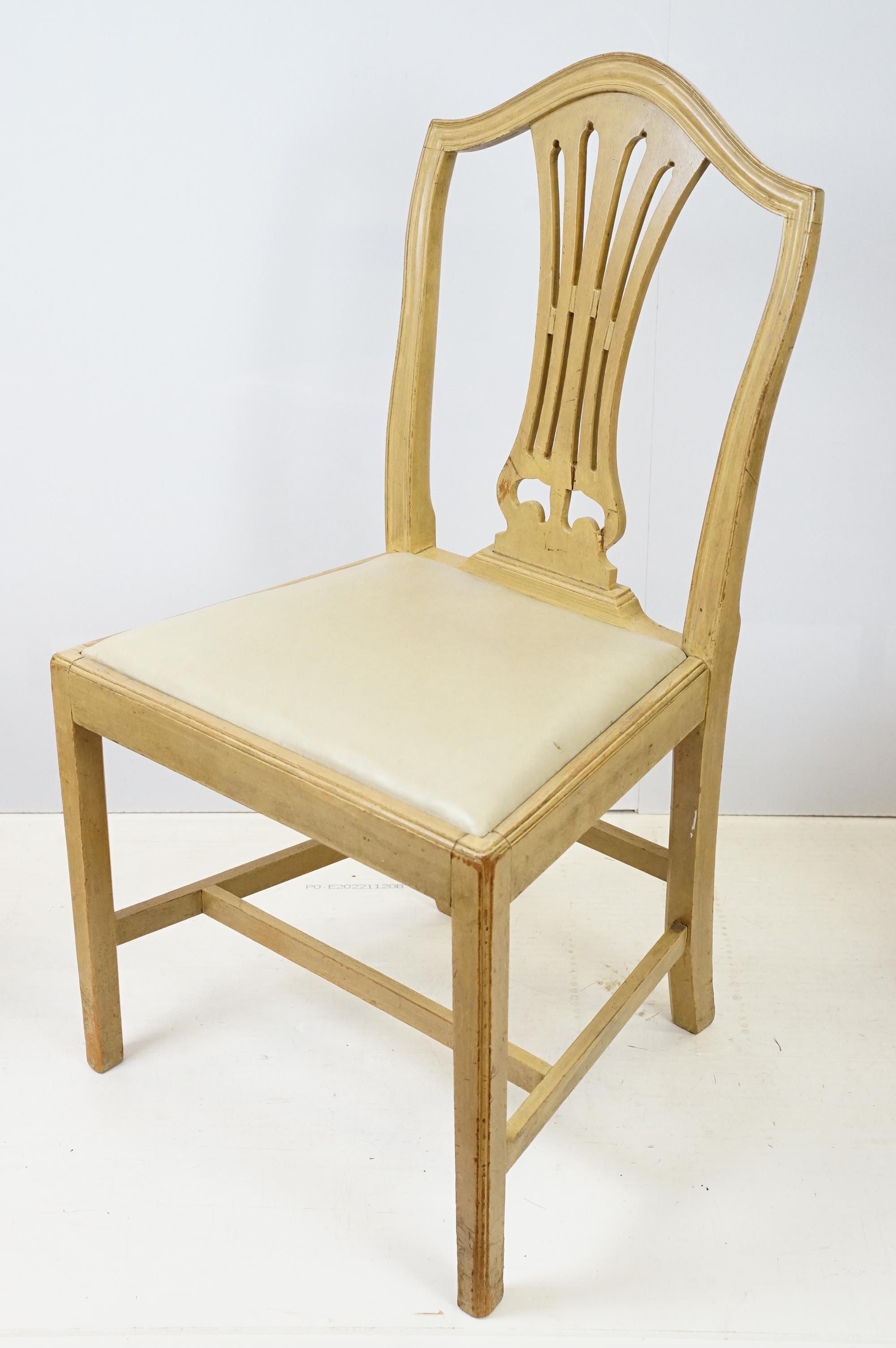 Group of four 20th Century stained oak dining chairs with cream drop in seats. - Image 6 of 9