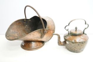 19th Century copper coal scuttle of helmet form together with a copper kettle with scrolled brass