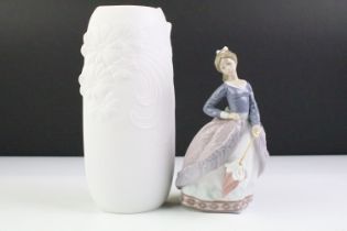 Lladro porcelain Evita Girl With Parasol (5212), together with a Kaiser white porcelain vase of