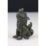 A Chinese ornamental bronze dog of faux statue.