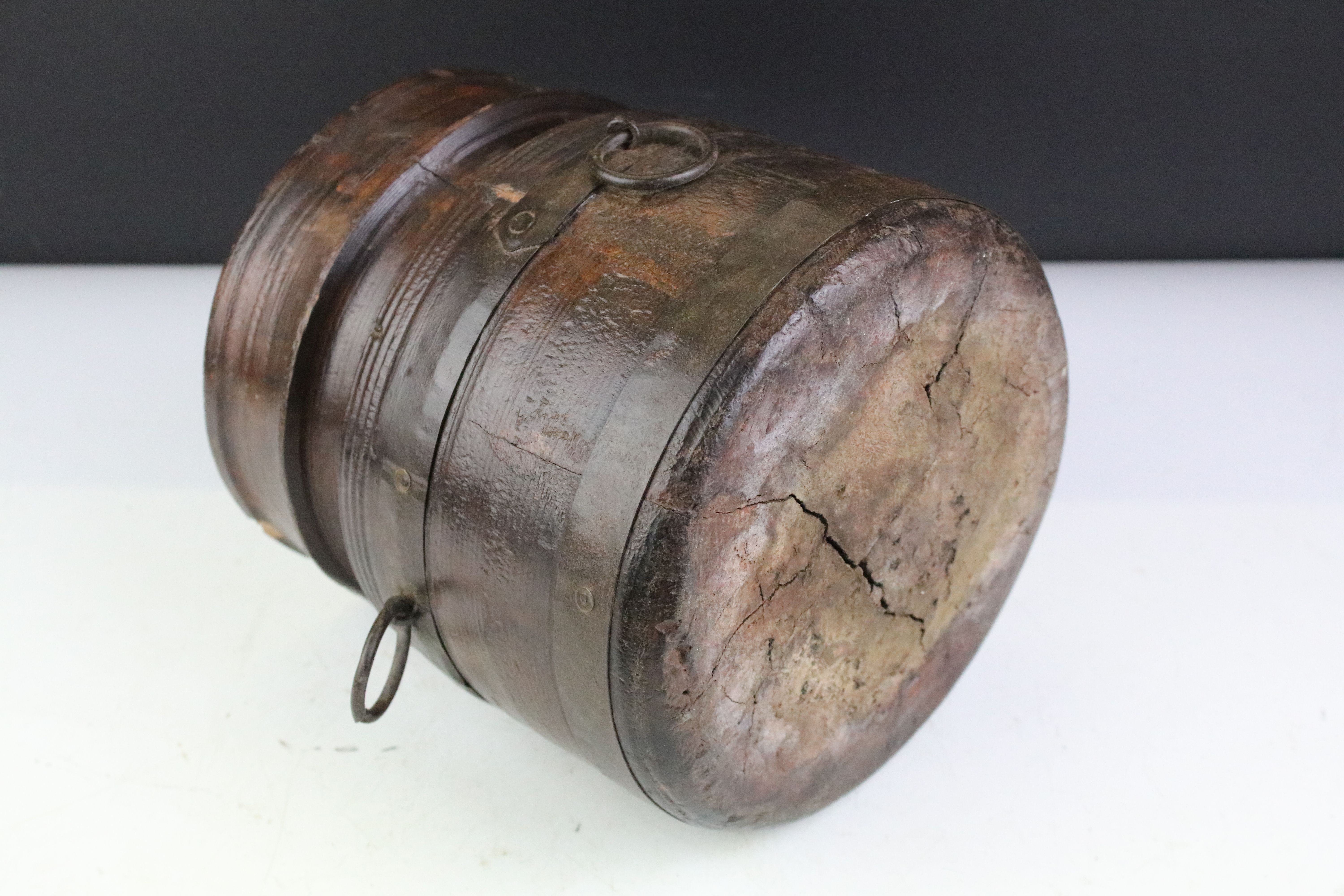 19th Century turned wooden pot having three cast metal ring handles. Measures 19cm tall. - Image 3 of 3