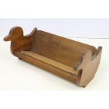 Vintage book trough with duck shaped terminals. Measures 38cm wide.