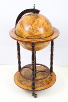 Terrestrial Globe Cocktail Cabinet, the hinged lid opening to a fitted interior, 90cm high