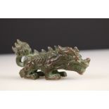 A traditional Chinese ornamental bronze lion figure.