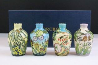 Set of four Moorcroft small baluster vases, ' The Seasons ', dated 2000, each 9.5cm high, with