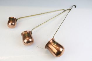 Set of Three Copper graduating hanging Spirit Measures / Ladles with brass labels for Whisky, Brandy