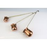 Set of Three Copper graduating hanging Spirit Measures / Ladles with brass labels for Whisky, Brandy