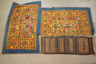 Collection of Indian and middle eastern textiles to include a pair of Indian embroidered curtains