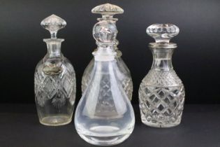 Cut glass decanter with silver collar, 25cm high, a cut glass decanter, 30.5cm high, a cut glass