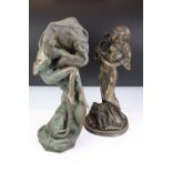 Two 20th Century cast resin faux bronze figurines in the form of a female figure holding a basket of