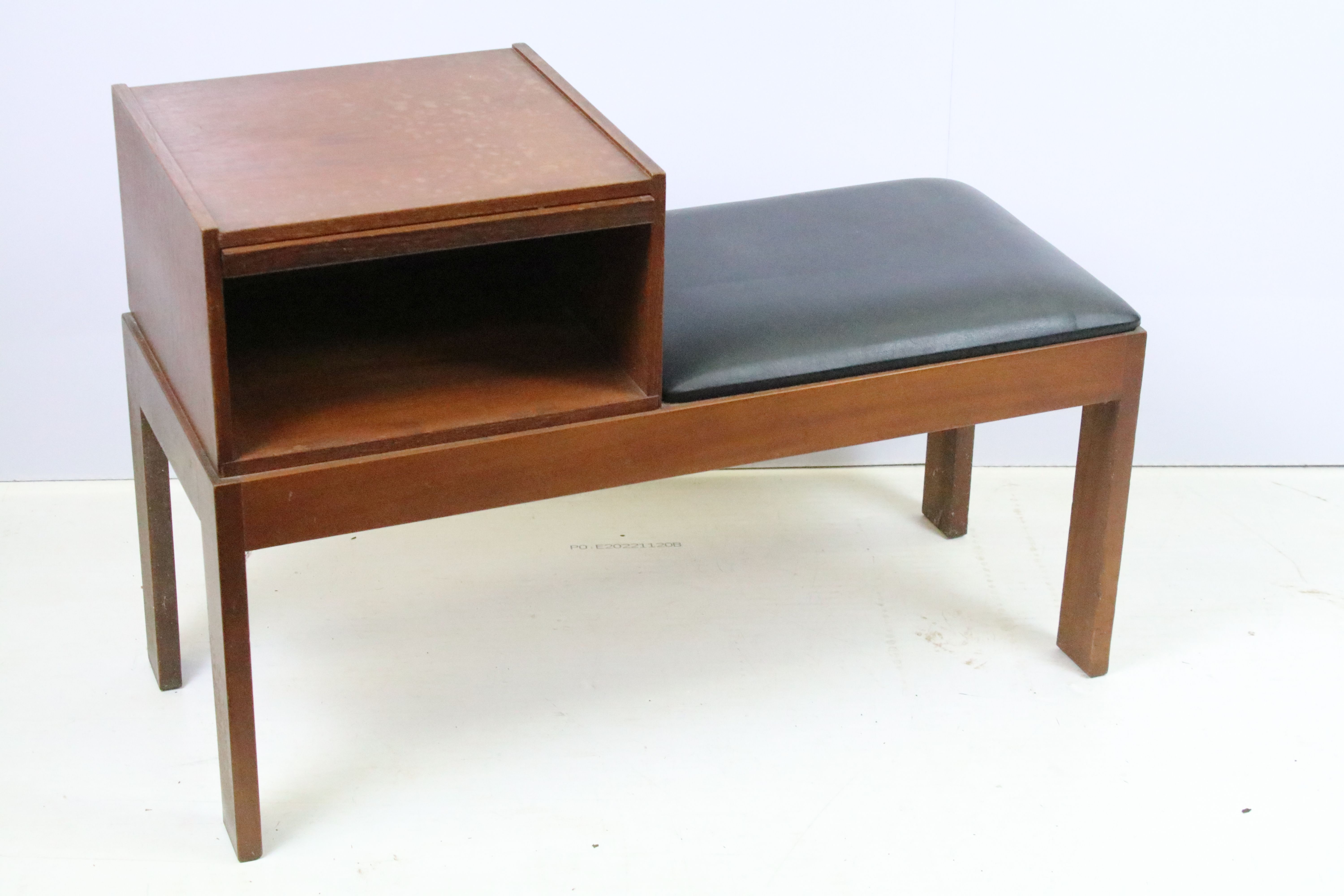 Mid Century vintage chippy telephone table with black leather seat. Measures 84cm wide.