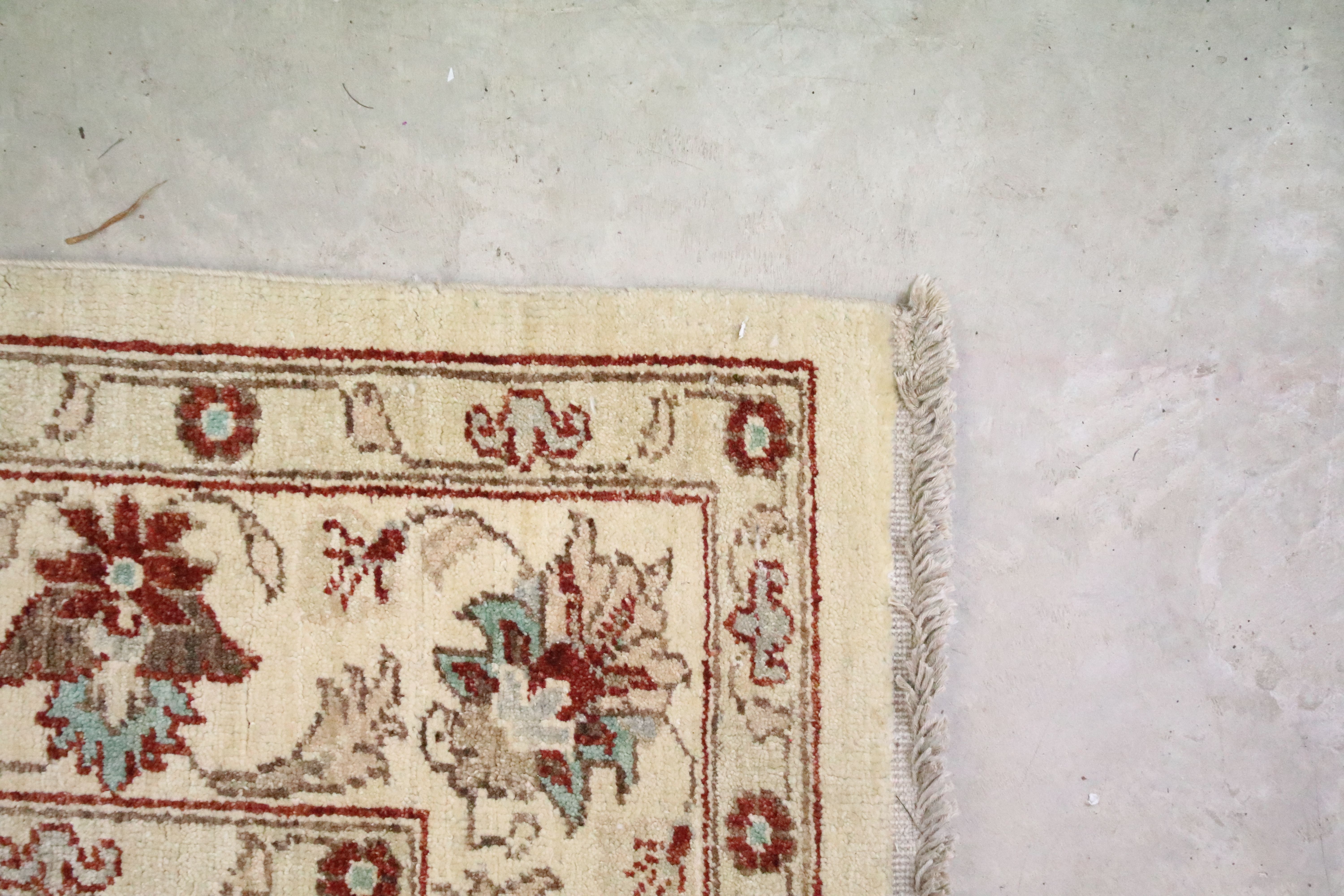 Cream ground rug with floral & leaf decoration and red & brown border, fringed to either end, - Image 4 of 7