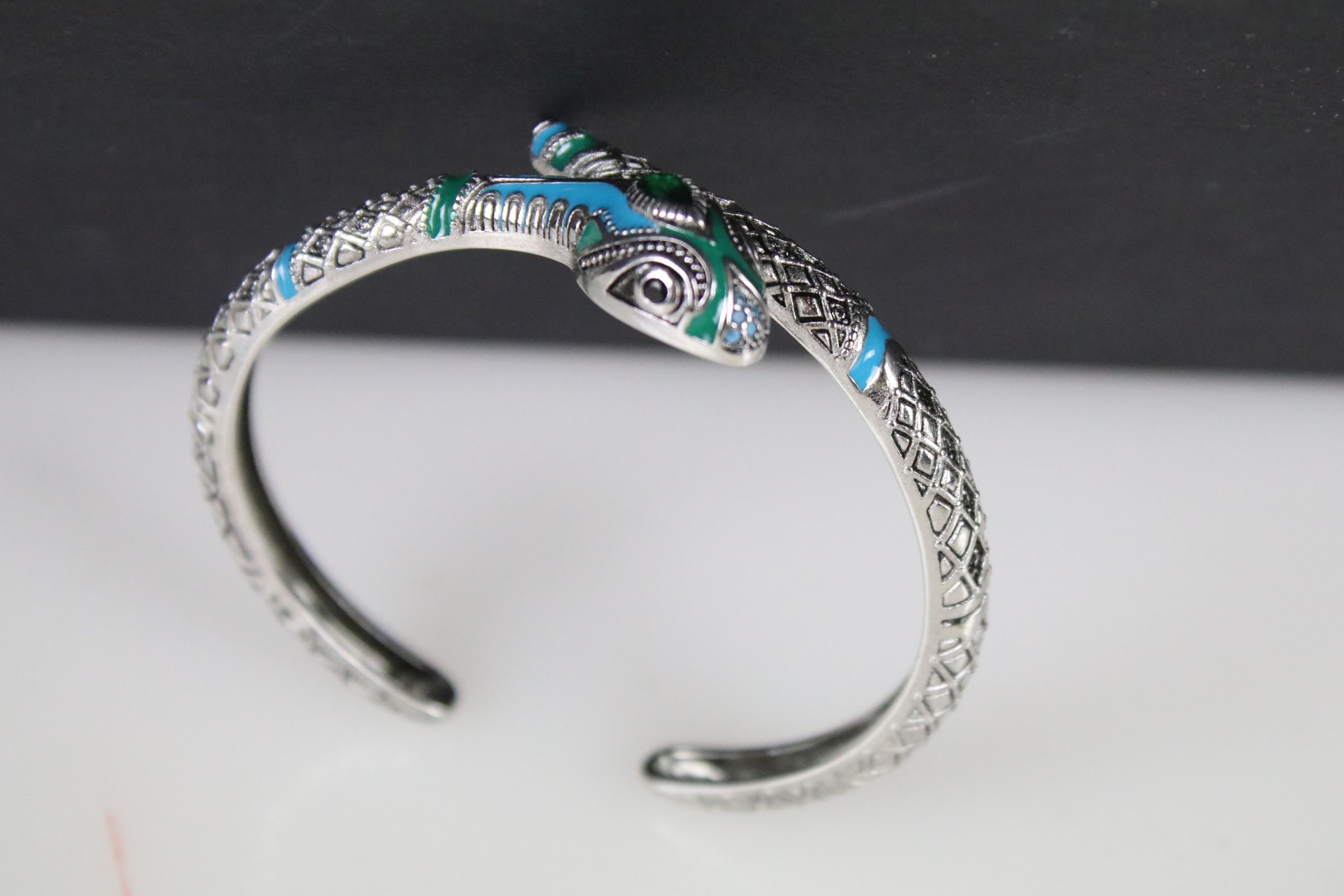 A ladies bangle bracelet with enamel decoration in the form of a snake, marked 925 to the verso. - Image 3 of 3