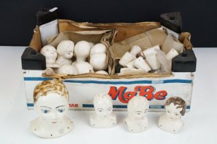 Collection of ceramic dolls heads, legs and arms with hand painted details. 1 box.